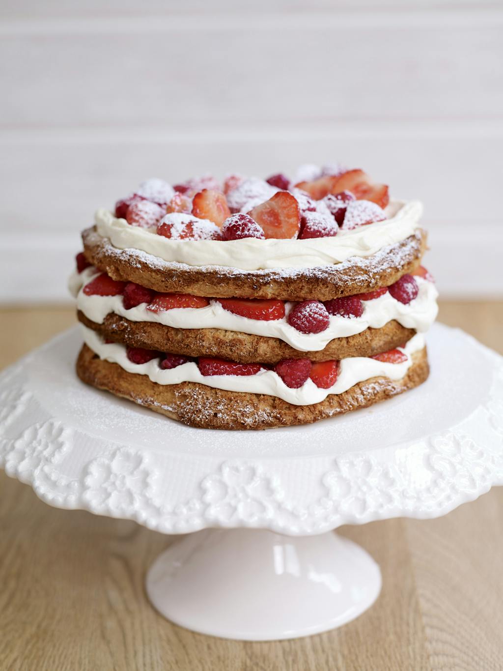 Hazelnut Meringue Layer Cake with Berry World Strawberries and Berry World Raspberries 75isn4juf