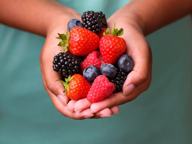 Full hand of Superior Taste Awarded berries